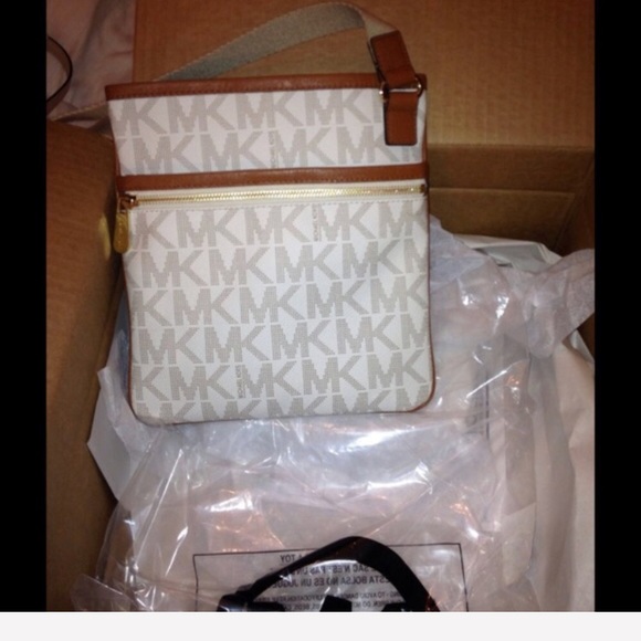 Michael Kors Handbags - NWT-my purse on sale listing full listing below